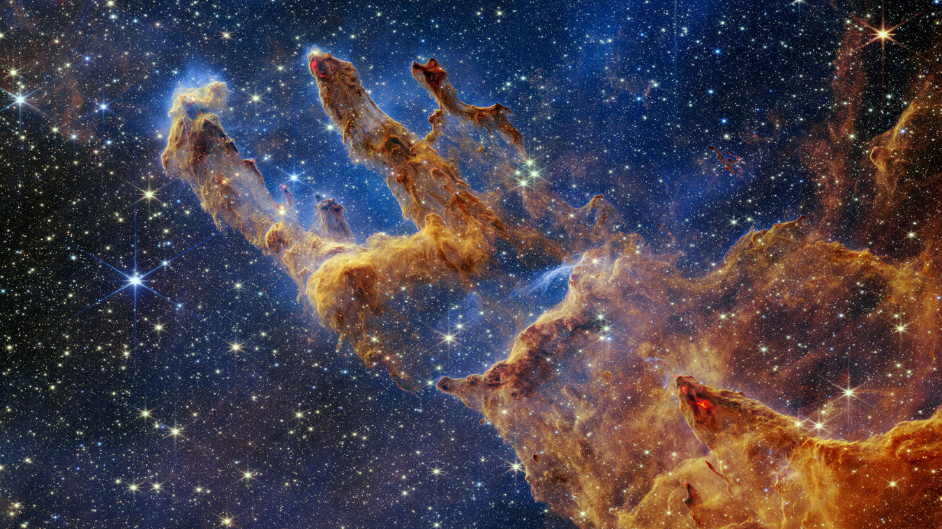 Grâce aux capacités infrarouges du télescope, des formations d’étoiles sont visibles sur ce nouveau cliché des « Piliers de la création ».