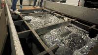 La drogue était cachée dans le faux plancher d’un camion-plateau.